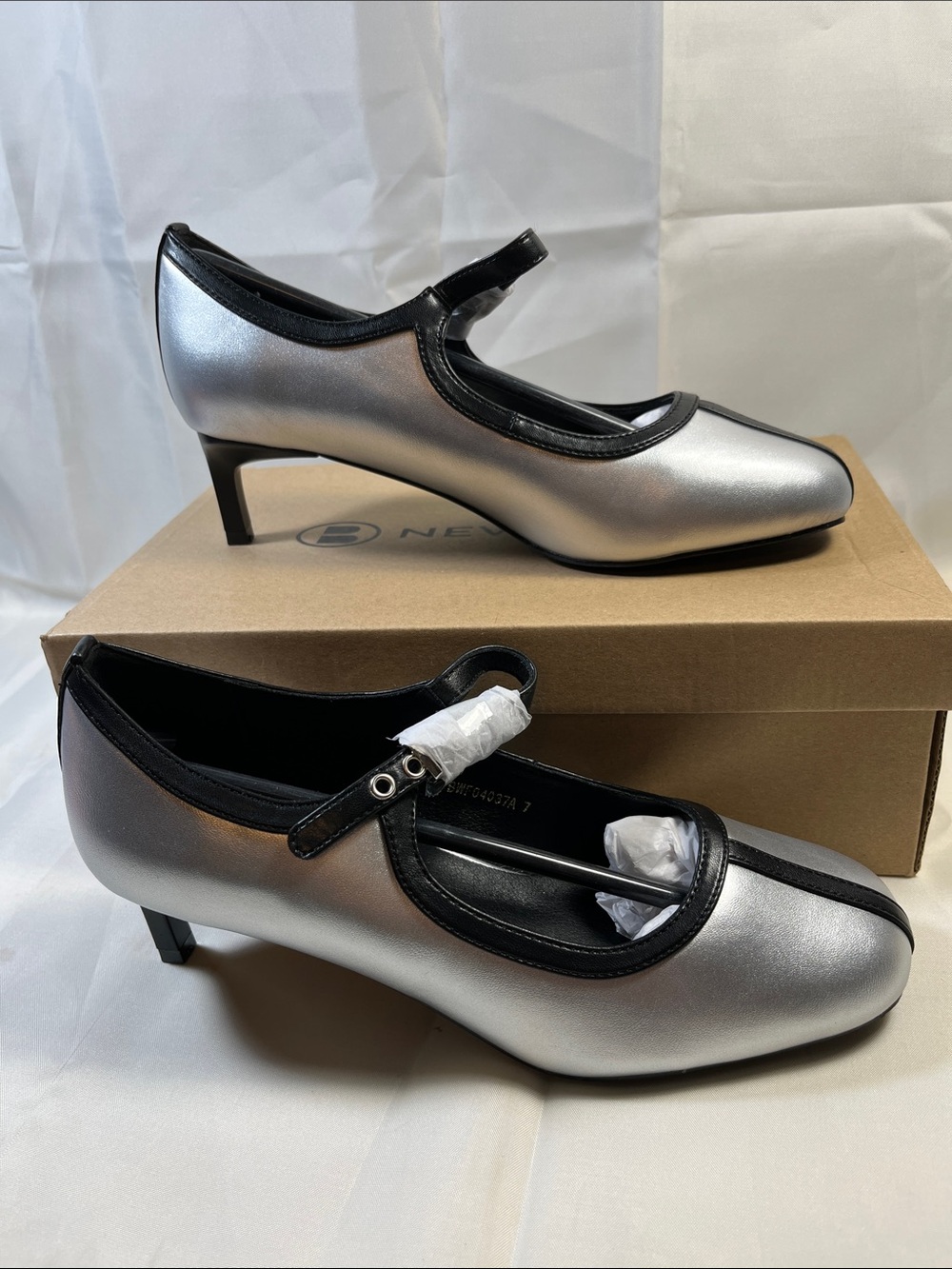 Silver Mary Jane Low Heel Pumps with Black Trim